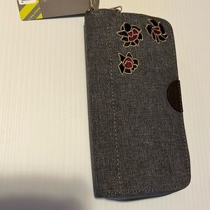 Grey wallet 8 inches - 12 slots for card. New with tag
